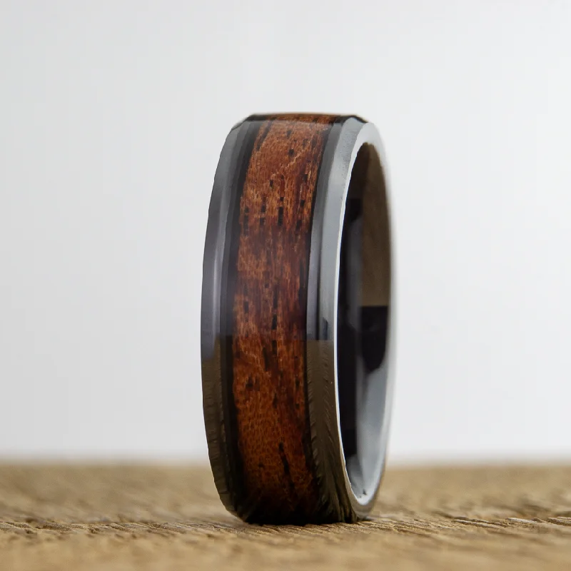 Black ring with Bubinga wood