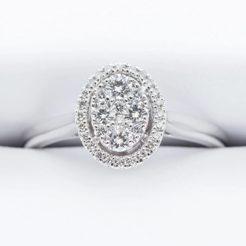 18ct White Gold Oval Diamond Halo Cluster Ring Engagement Ring